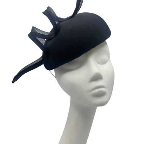 Black headpiece with black swirl detail to the top, very elegant.
